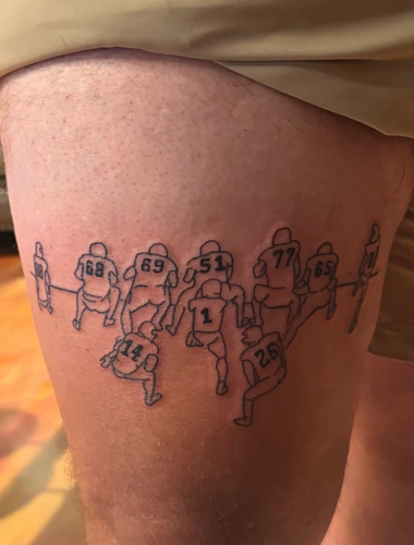 Fine line football team outline tattoo on the thigh by Stevo at Golden Tarot Ink Club